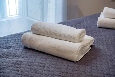 Letto o letti in una camera di Stay in Naples Flats Toledo