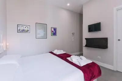 Letto o letti in una camera di Up25