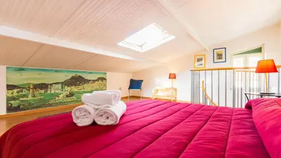 Letto o letti in una camera di Terrazza San Paolo by Napoliapartments