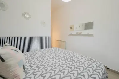 Letto o letti in una camera di Luli House Napoli