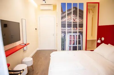 Letto o letti in una camera di South Hands Luxury Rooms