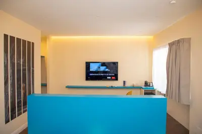 TV o dispositivi per l'intrattenimento presso South Hands Luxury Rooms