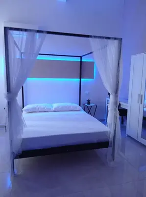 Letto o letti in una camera di RELAIS TORRE GLORIA