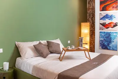 Letto o letti in una camera di Neocore