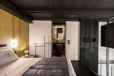 Letto o letti in una camera di Unicum Suite Napoli Centro Storico