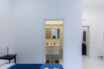 Letto o letti in una camera di Il Vicoletto del Castello