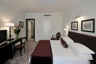 Letto o letti in una camera di Grand Hotel Oriente