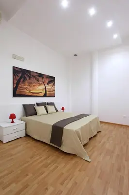 Letto o letti in una camera di Napoli Sea