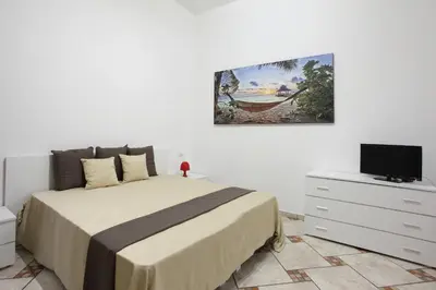 Letto o letti in una camera di Napoli Sea