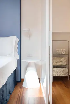 Letto o letti in una camera di Suite dell'Ovo - Dimore Partenopee