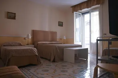 Letto o letti in una camera di Pagina Storica di Napoli