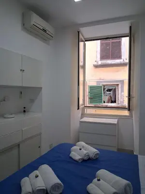 Letto o letti in una camera di La Casa di Rosy