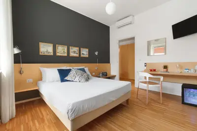 Letto o letti in una camera di Vivaldo Suite Piazza dei Martiri - Guest House