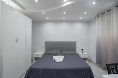 Letto o letti in una camera di Smart’s House Deluxe Quartieri Spagnoli