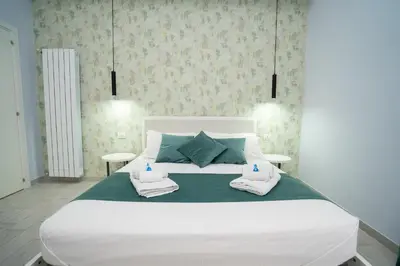 Letto o letti in una camera di Mida's Boutique Rooms
