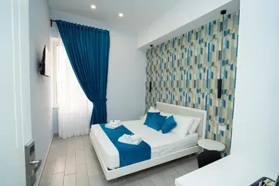 Letto o letti in una camera di Mida's Boutique Rooms