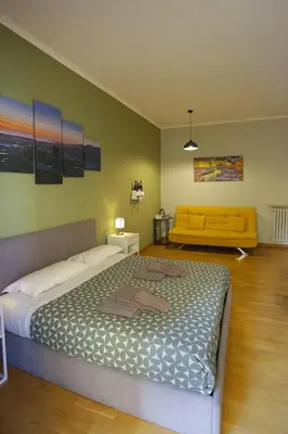 Letto o letti in una camera di Vomero Maison