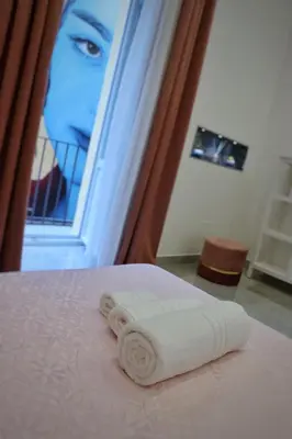 Letto o letti in una camera di Barbaro Suite & Apartment
