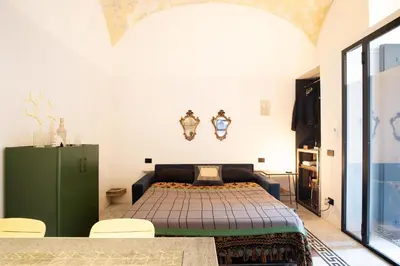 Letto o letti in una camera di Casa Fauno by Dimorra