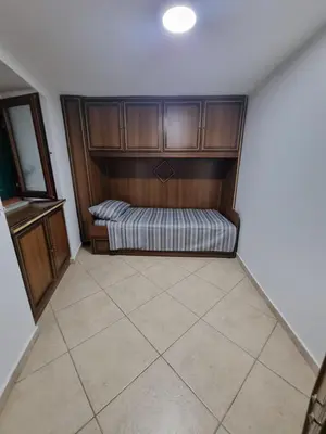Letto o letti in una camera di B&b casa (le porte di napoli)