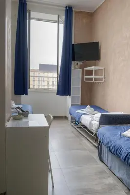 Letto o letti in una camera di Dimora dei Sogni