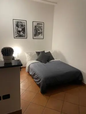 Letto o letti in una camera di MammaRo's House