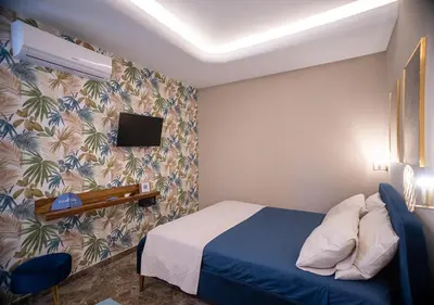 Letto o letti in una camera di Le stanze di Cloe