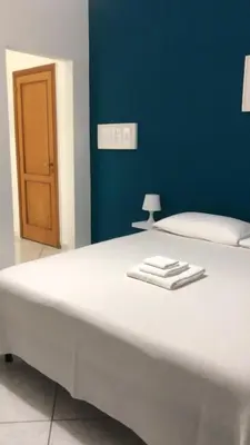 Letto o letti in una camera di Casa Maria