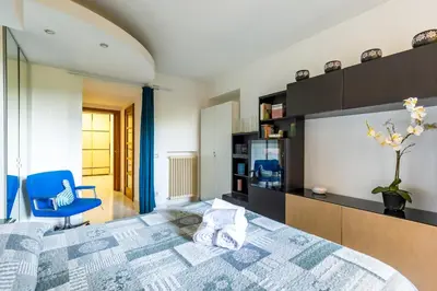 Letto o letti in una camera di Giardino Margherita