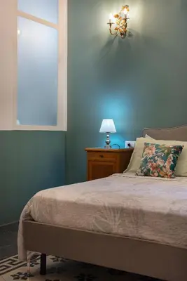 Letto o letti in una camera di Vintage Suite Napoli