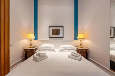 Letto o letti in una camera di Corte Satriano Residence
