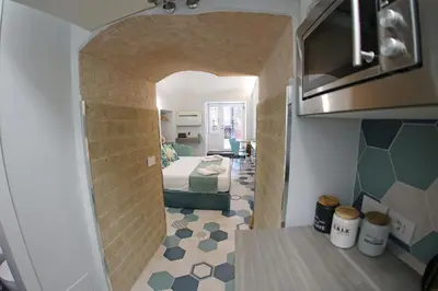Cucina o angolo cottura di Suite Na' poesia Mergellina