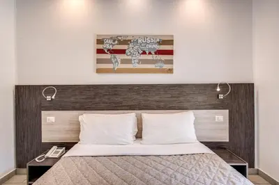 Letto o letti in una camera di Napoli Suite