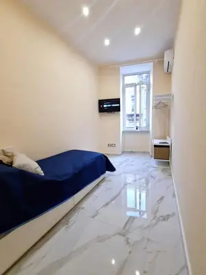 Letto o letti in una camera di Re Ferdinando Apartment