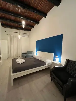 Letto o letti in una camera di Donna Luisa a Santa Chiara
