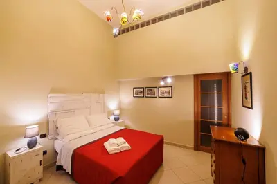 Letto o letti in una camera di The San Gregorio Armeno Apartment By HouseinNaples