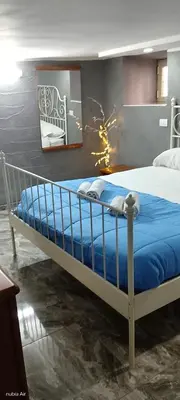 Letto o letti in una camera di Casa gioia