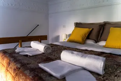 Letto o letti in una camera di Casa Antica Pizzofalcone