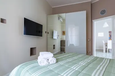 Letto o letti in una camera di Napoli Heartbeat by Napoliapartments