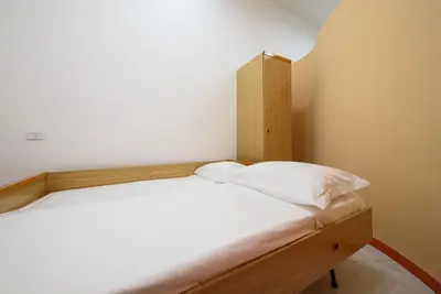 Letto o letti in una camera di Via Avvocata 25