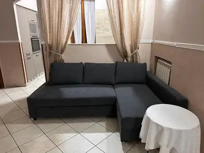 Area soggiorno di SpaccaNapoli Home