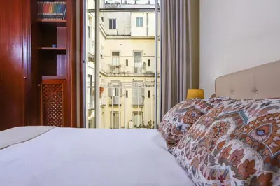 Letto o letti in una camera di CuoreNapoletano Apartment