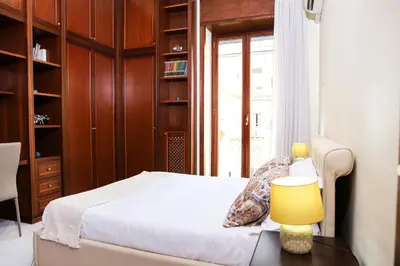 Letto o letti in una camera di CuoreNapoletano Apartment