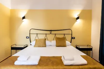 Letto o letti in una camera di Sebeto Duomo