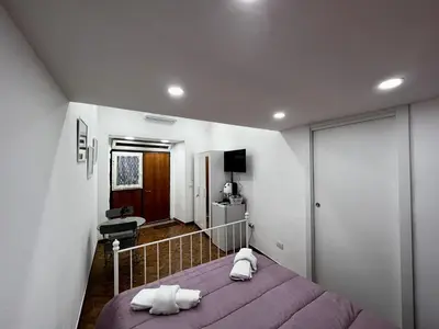 Letto o letti in una camera di Piazza Carità Love Suite
