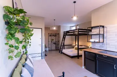 Letto o letti in una camera di Tiny Daisy House