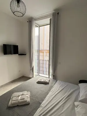 Letto o letti in una camera di Casa e Mariella