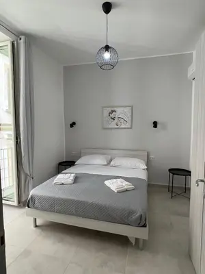 Letto o letti in una camera di Casa e Mariella