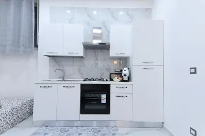 Cucina o angolo cottura di Casa Tolentino al centro di Napoli