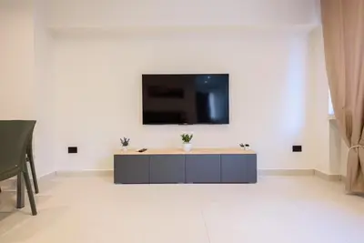 TV o dispositivi per l'intrattenimento presso Tommaseo Sea View Apartments